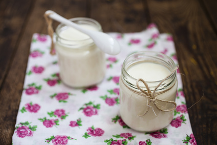 yogurt in small jars on a table, selective focus