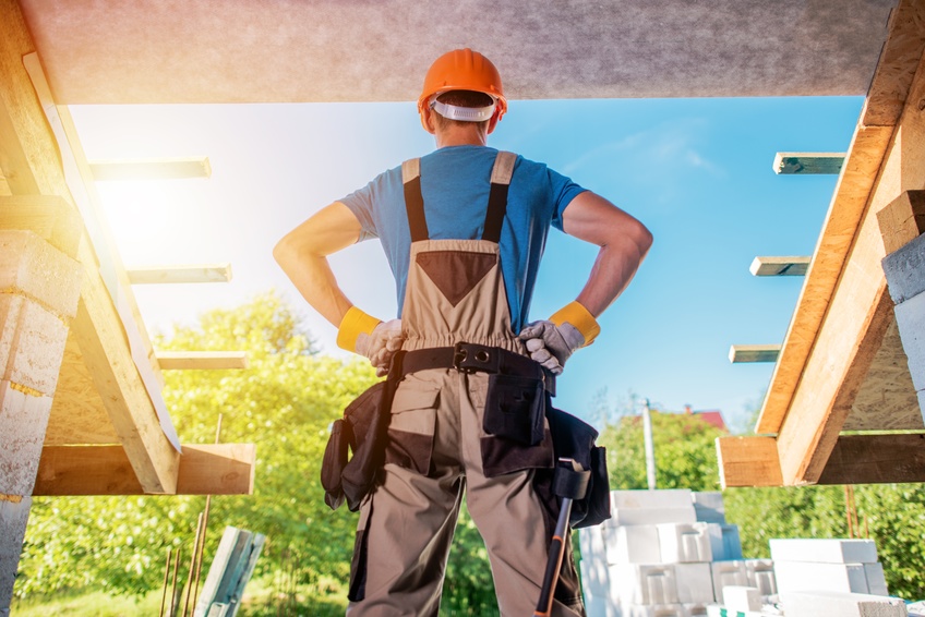 New House Building Project. Construction Contractor Worker in the Middle of Future Balcony Entrance Preparing For the Next Move. Home Builder.