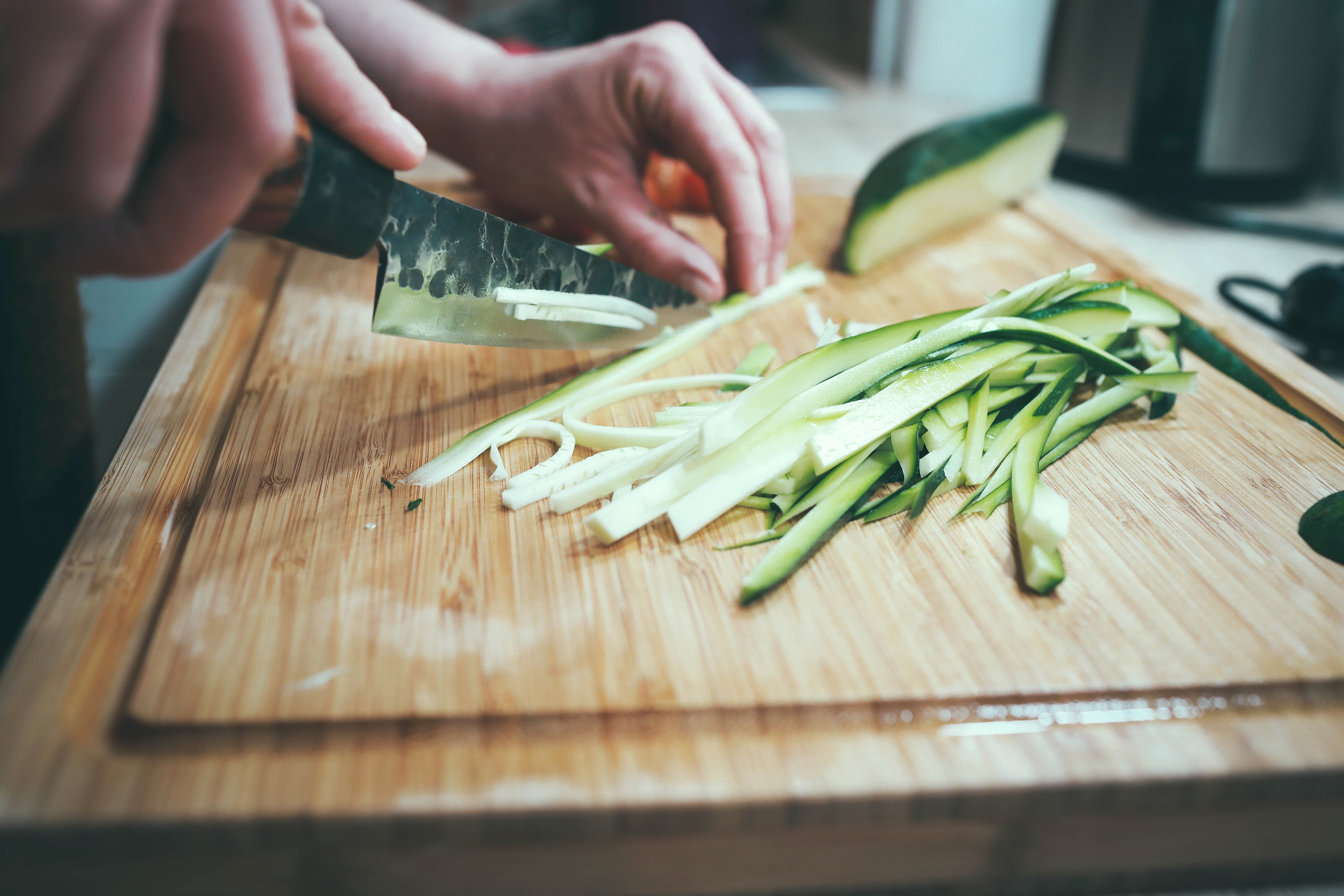 healing salicylates histamine chopping cucumber on a wooden board